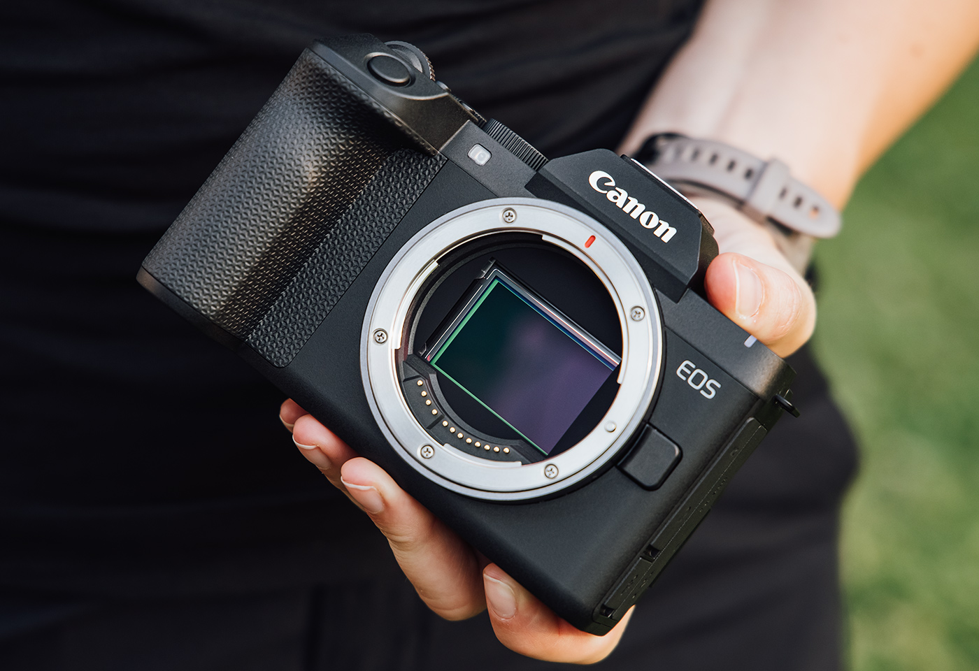 Canon mirrorless camera with the lens removed, showing the large full-frame sensor inside the camera body